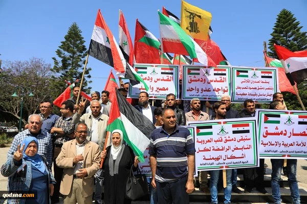 حمایت از قلب محور مقاومت در پایتخت مقاومت؛اهتزار پرچم ایران و آتش زدن پرچم آمریکا در فلسطین+تصاویر 2