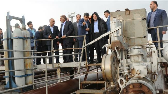 Iran cuts oil output in some areas to save flood-hit people