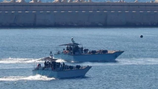 Israeli navy fires warning shots at Gaza fishing boats attempting to break blockade