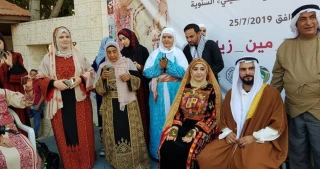 يوم الزي الفلسطيني ... أثواب بلون الكل الفلسطيني