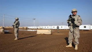 Two Americans, Briton killed in attack on base housing US Terrorists near Baghdad