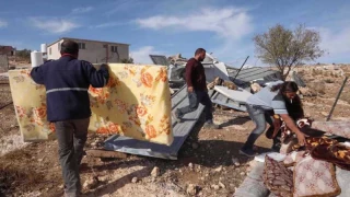 Zionist entity forces Palestinian brothers to demolish own home in West Bank