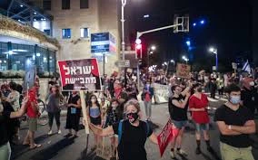 Israel protesters place washing machines in front of Netanyahu’s home
