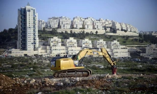 Israel levels land east of Al-Quds to expand illegal settlement