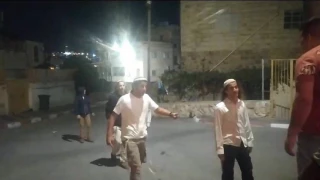 Zionist settlers, backed by regime forces, stab Palestinian man in al-Khalil