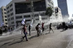 Zionist forces clash with anti-Netanyahu protesters in Tel Aviv