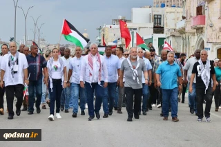رئیس‌جمهور کوبا با چفیه در راهپیمایی حمایت از فلسطین