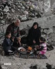 افطار خانواده‌ فلسطینی در میان آوار مدرسه‌ای ویران‌ شده در غزه+ تصاویر 3
