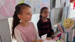 أطفال يعرضون أعمالهم الفنية في معرض «ألم وأمل» بمواصي خان يونس 2