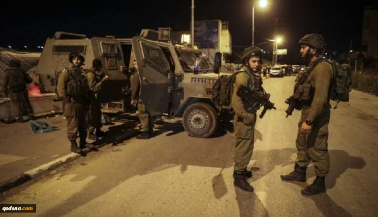 Zionist troops raid West Bank towns, arrests Palestinians