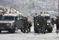 Zionist troops raid homes, kidnap dozens of Palestinians in W. Bank